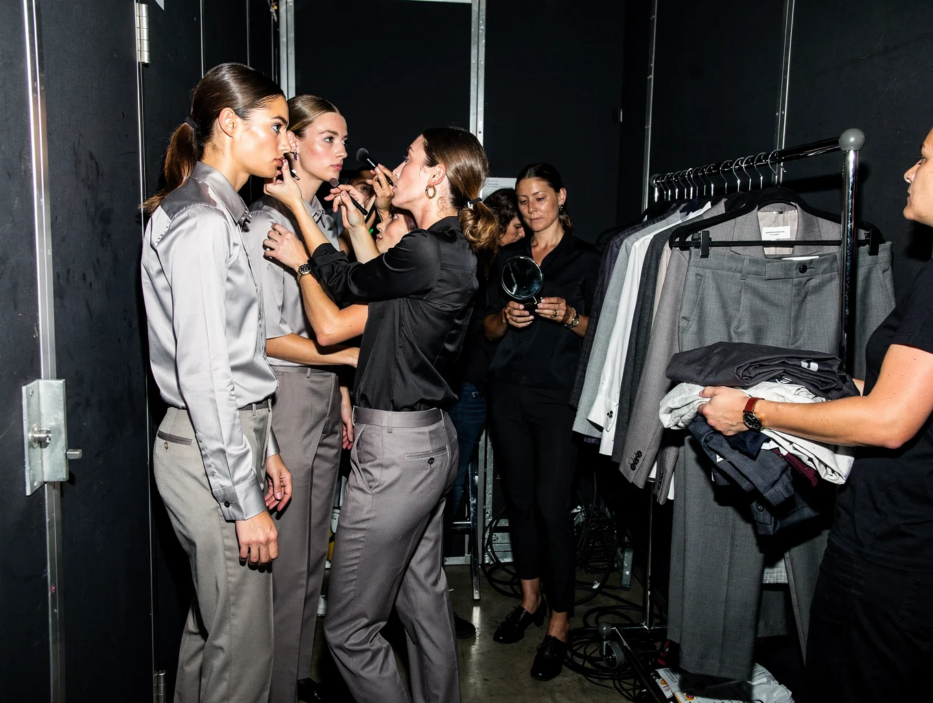 Backstage preparation for a high-fashion pageant